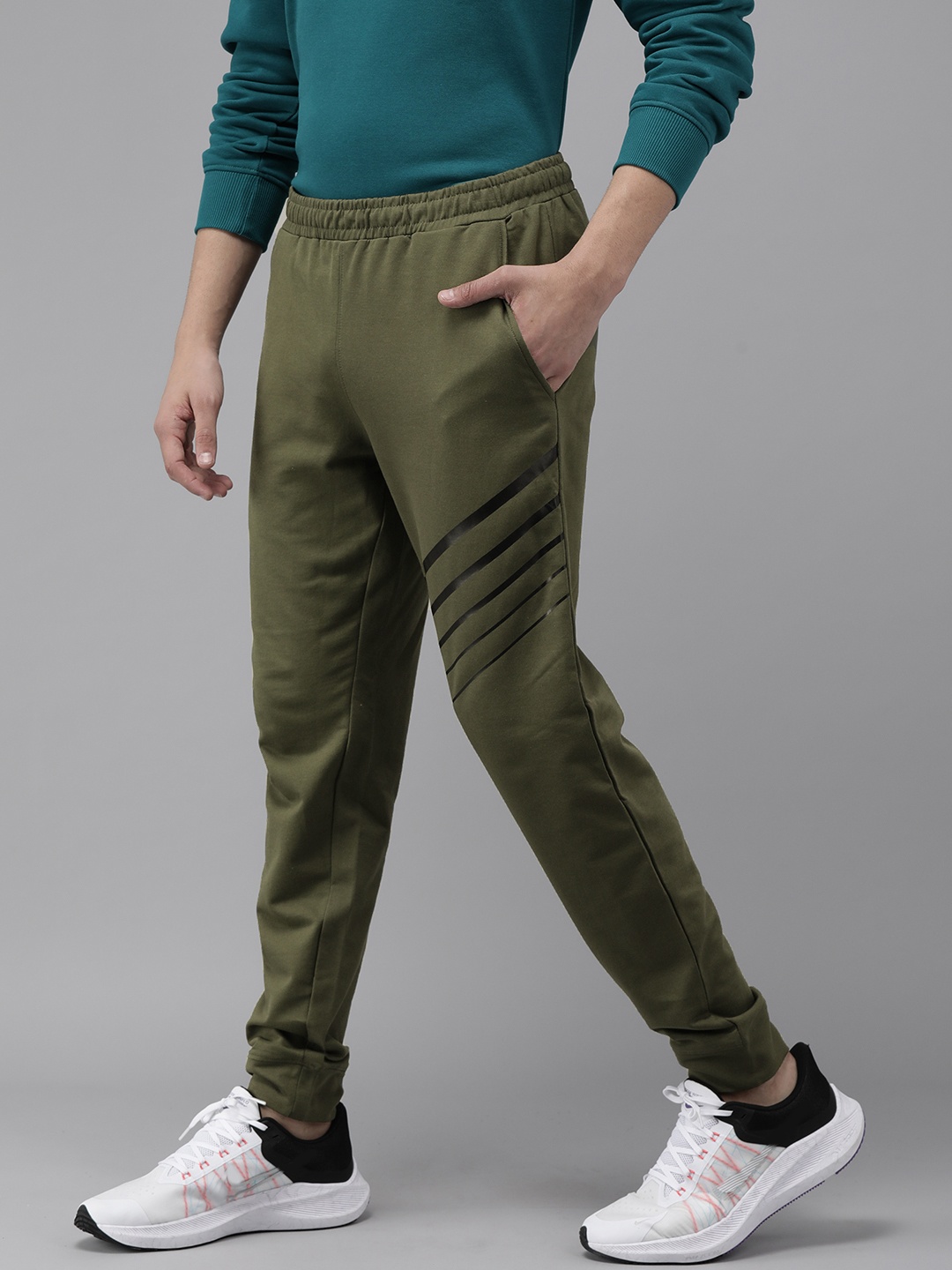 

Wildcraft Men Olive Green Solid Joggers with Striped Detailing