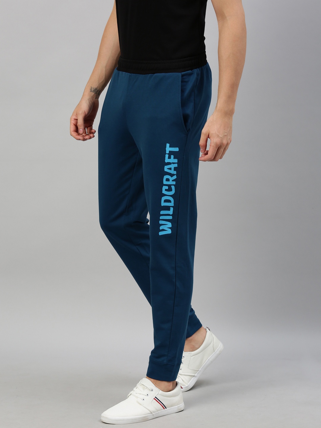 

Wildcraft Men Teal Blue Solid Straight Fit Joggers With Printed Detail