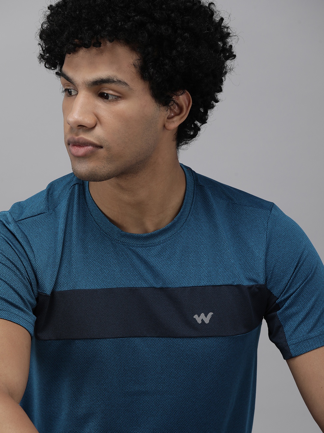 

Wildcraft Men Teal Solid T-shirt with Navy Blue Solid Stripe