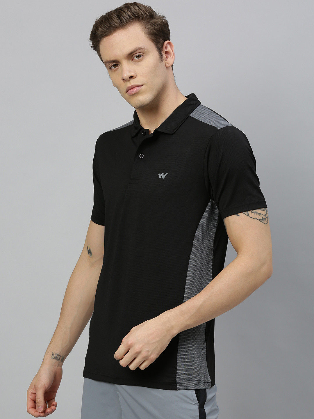 

Wildcraft Men Black Solid Polo Collar T-shirt