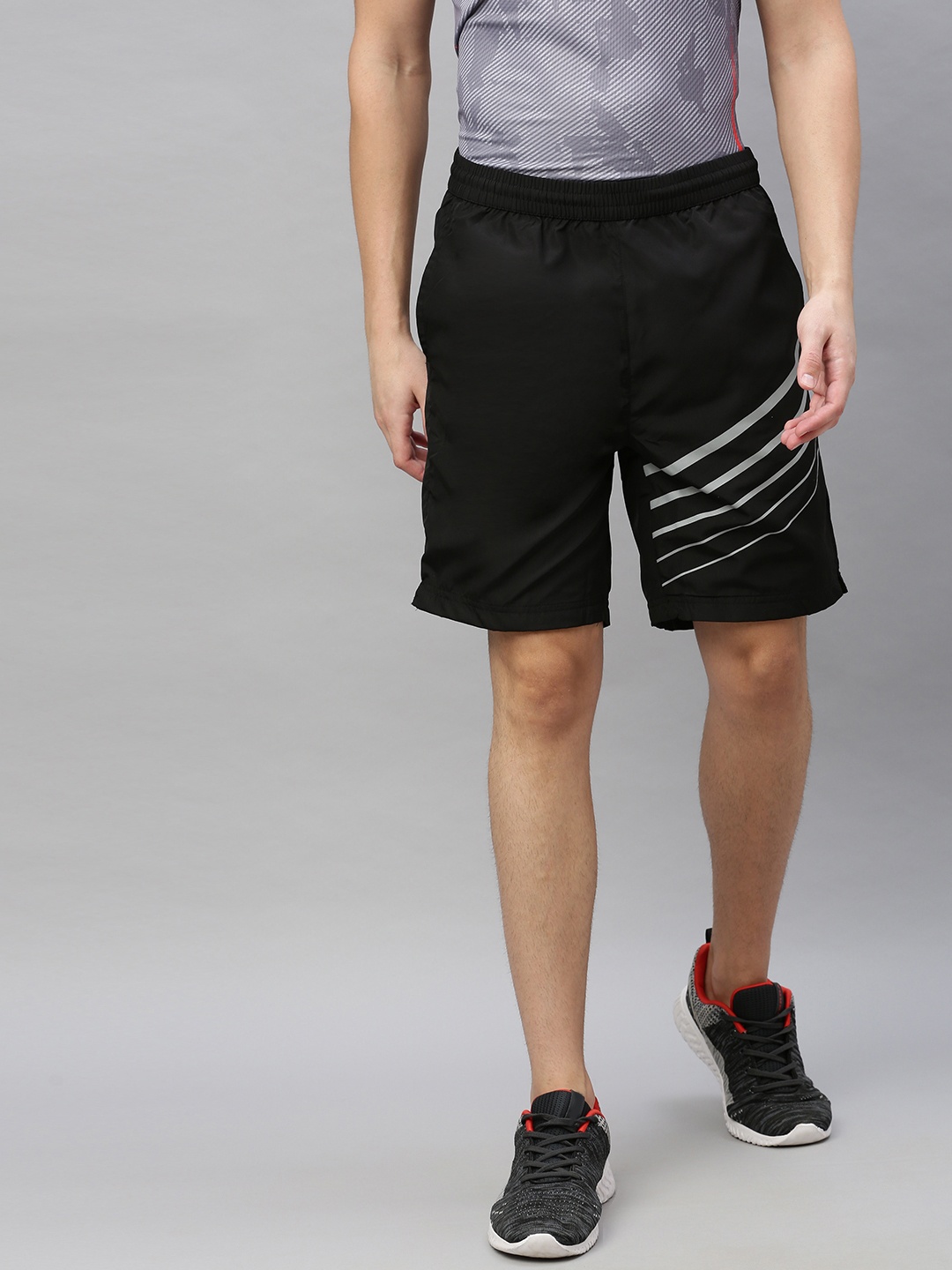 

Wildcraft Men Black Striped Regular Fit Regular Shorts