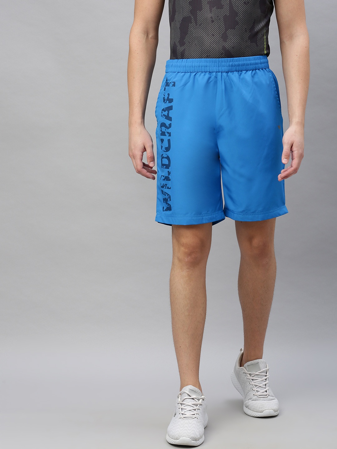 

Wildcraft Men Blue Printed Regular Fit Active Sports Shorts