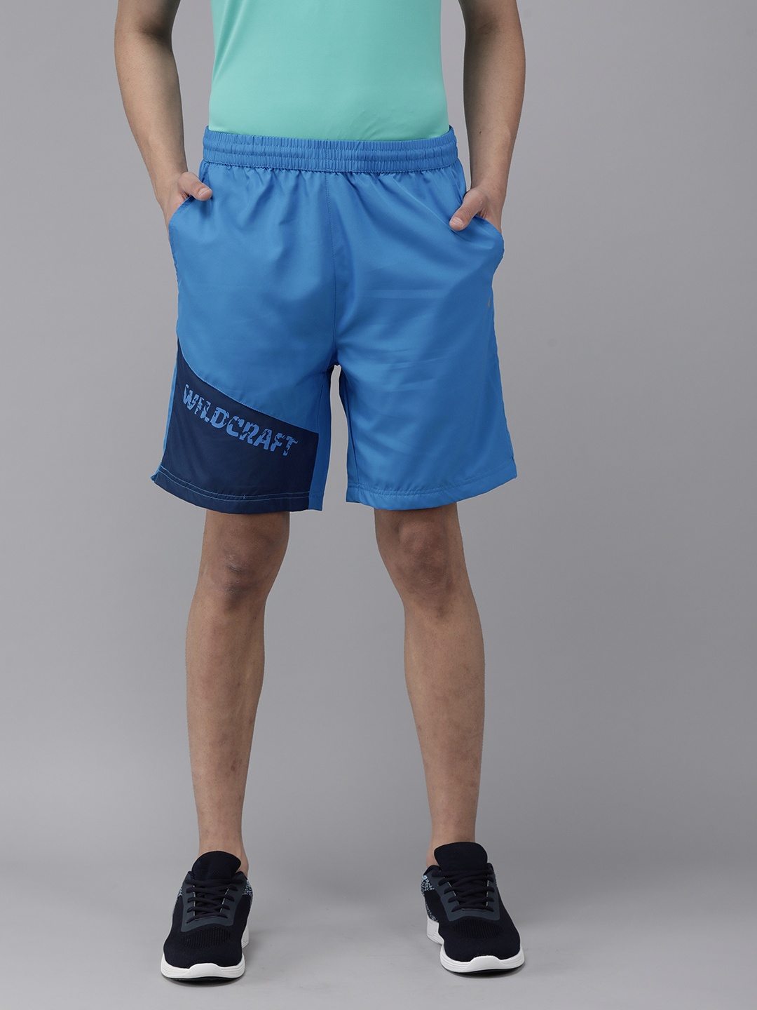 

Wildcraft Men Blue Colourblocked Brand Logo Sports Shorts