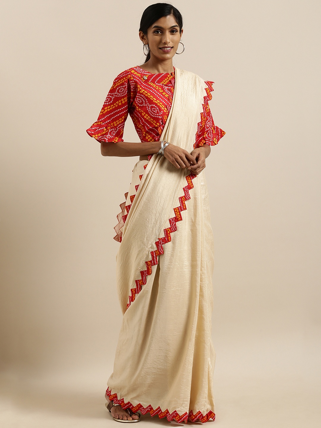 

SHAVYA Off-White Solid Silk Blend Saree With Patchwork on the Border