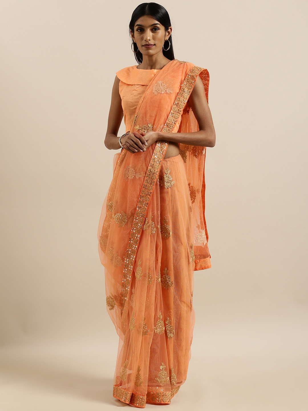 

SHAVYA Peach-Coloured & Golden Net Embroidered Saree