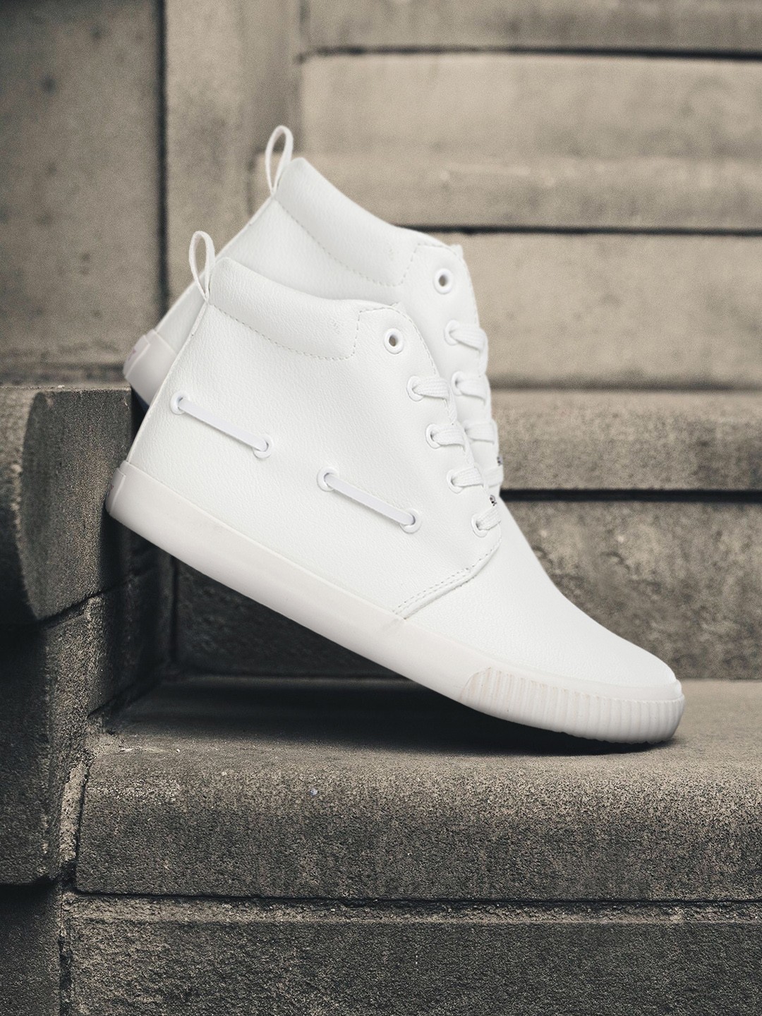 

Roadster Men White Solid Synthetic Mid-Top Sneakers
