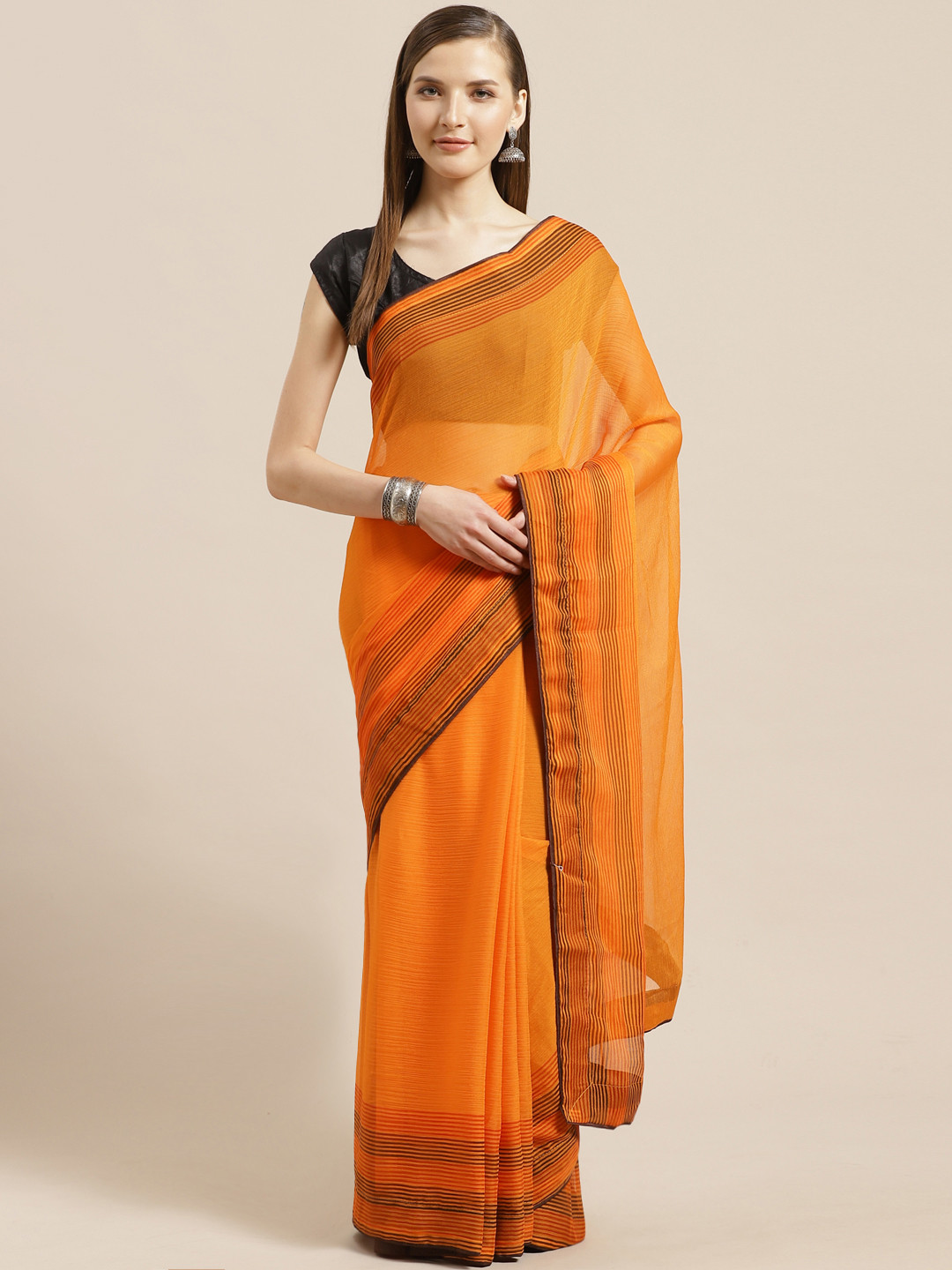 

Mitera Orange Solid Saree