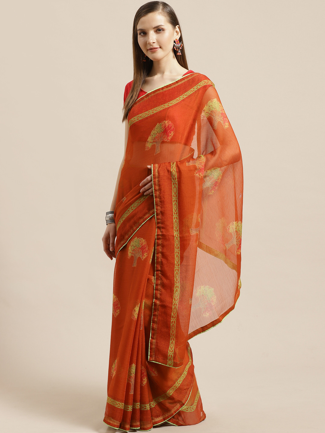 

Mitera Rust Orange & Green Printed Saree