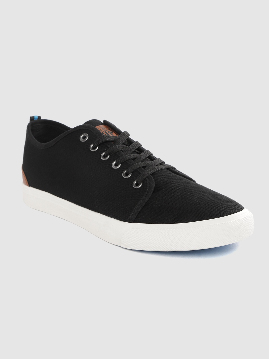 

Roadster Men Black Solid Sneakers