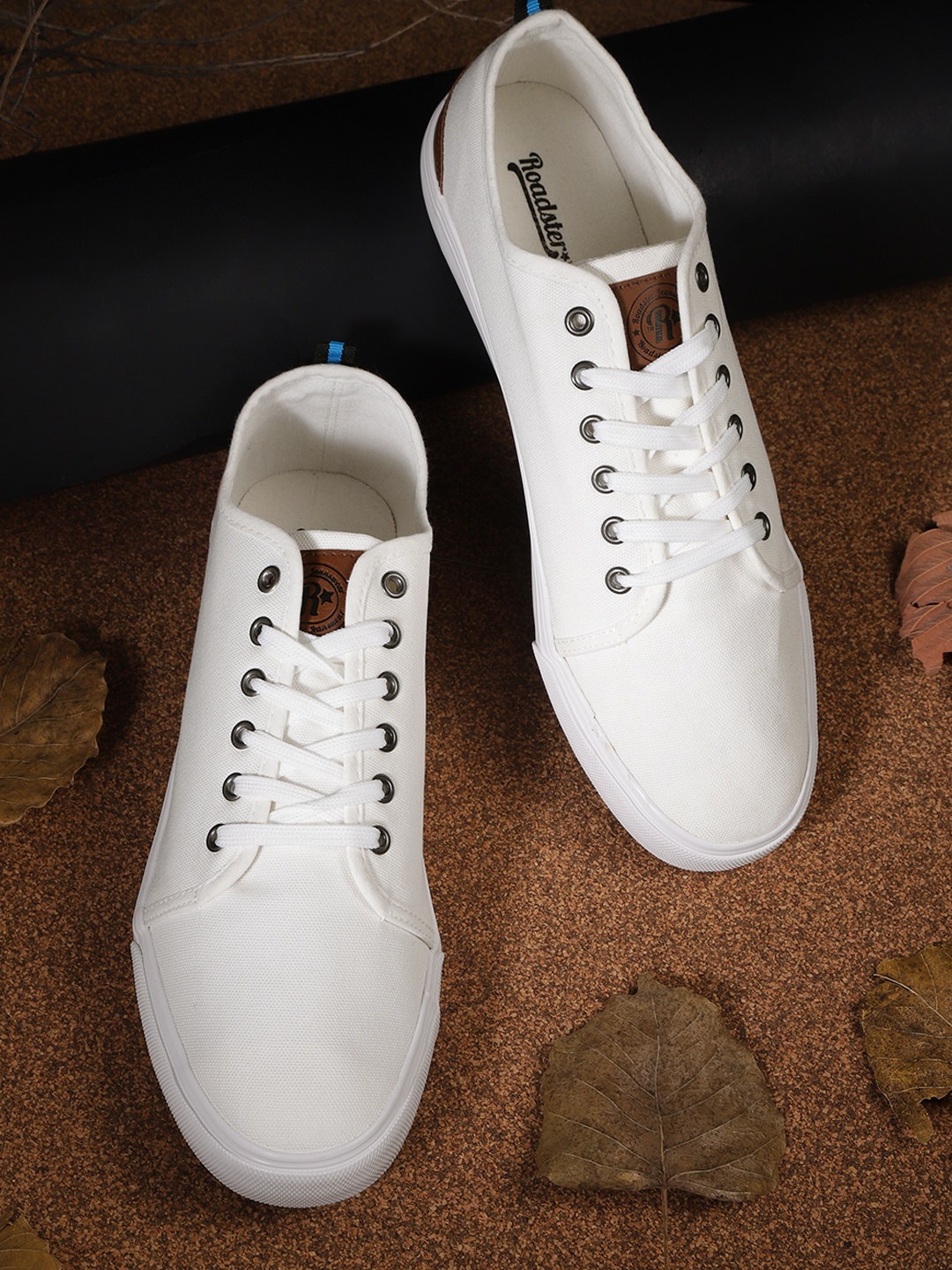 

Roadster Men White Solid Sneakers