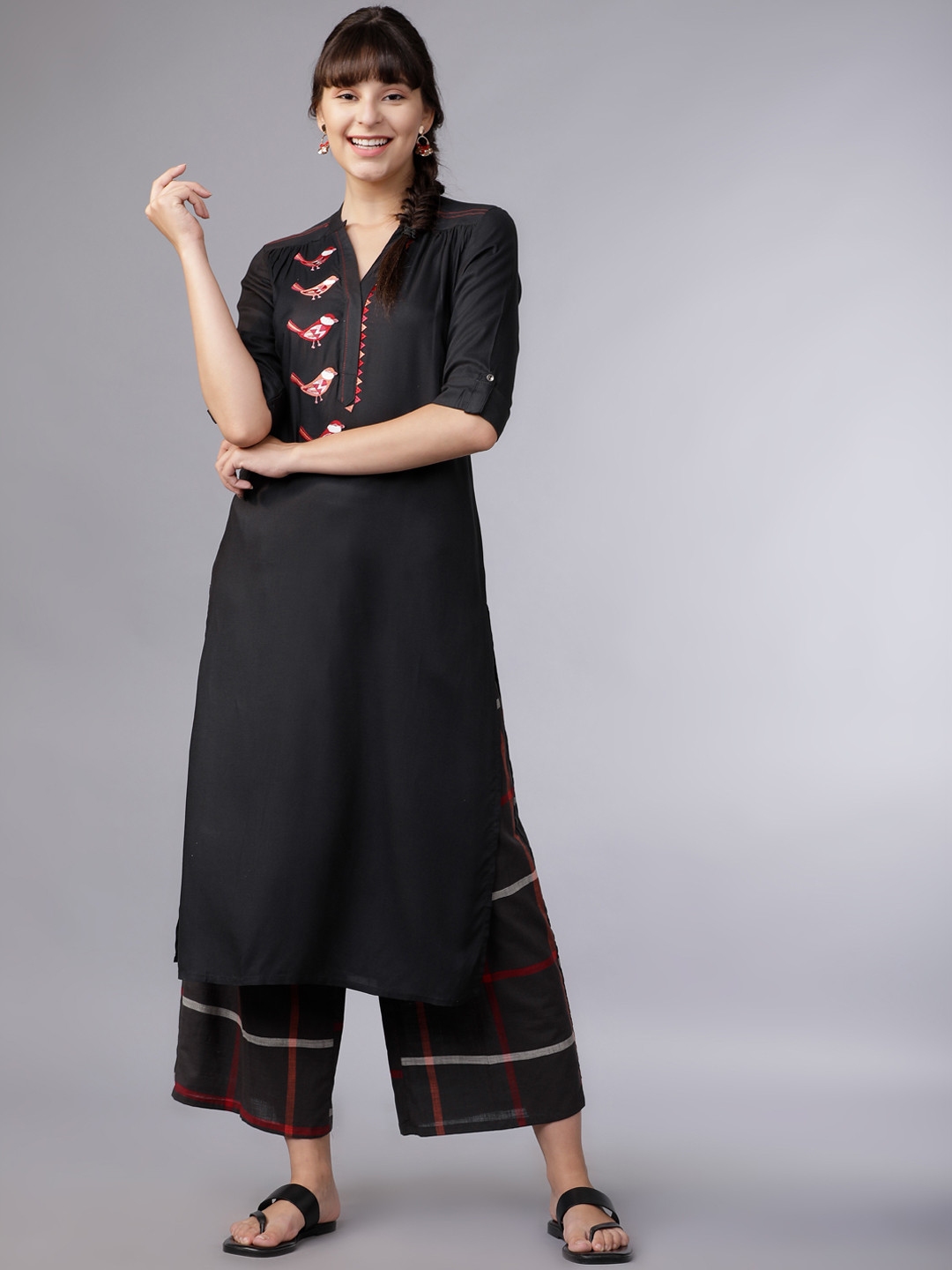 

Vishudh Women Black & Red Embroidered Kurti with Palazzos