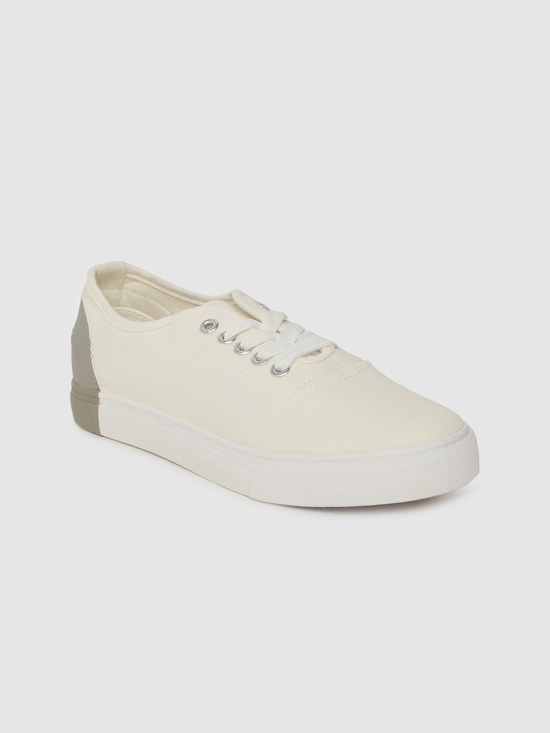 

Roadster Women Off-White Solid Sneakers