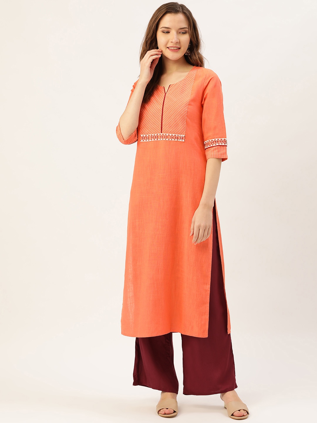 

Jaipur Kurti Women Orange & Maroon Yoke Design Kurta with Palazzos