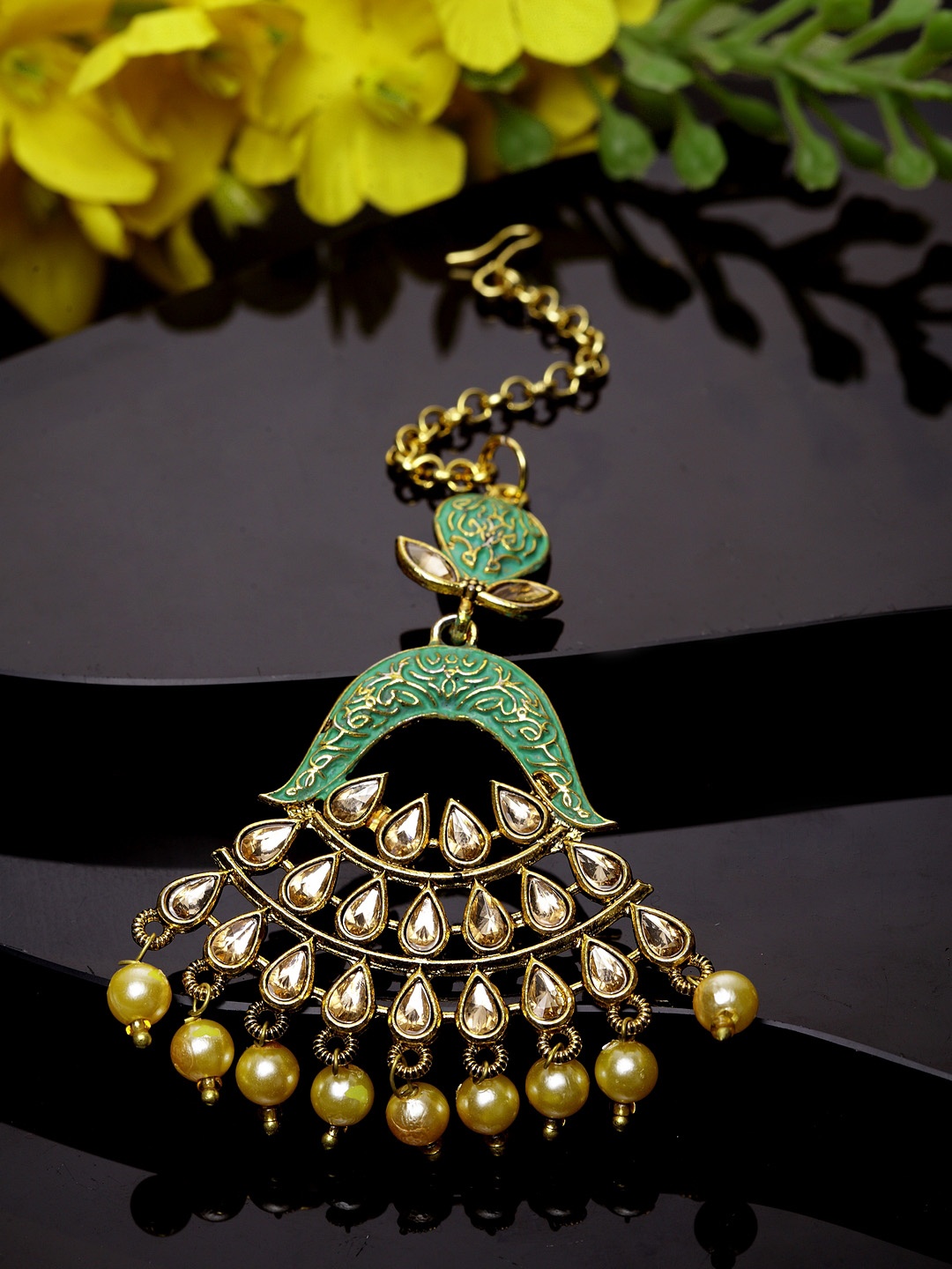 

ANIKAS CREATION Gold-Plated & Green Stone Studded Enameled Hand Painted Traditional Maang Tikka