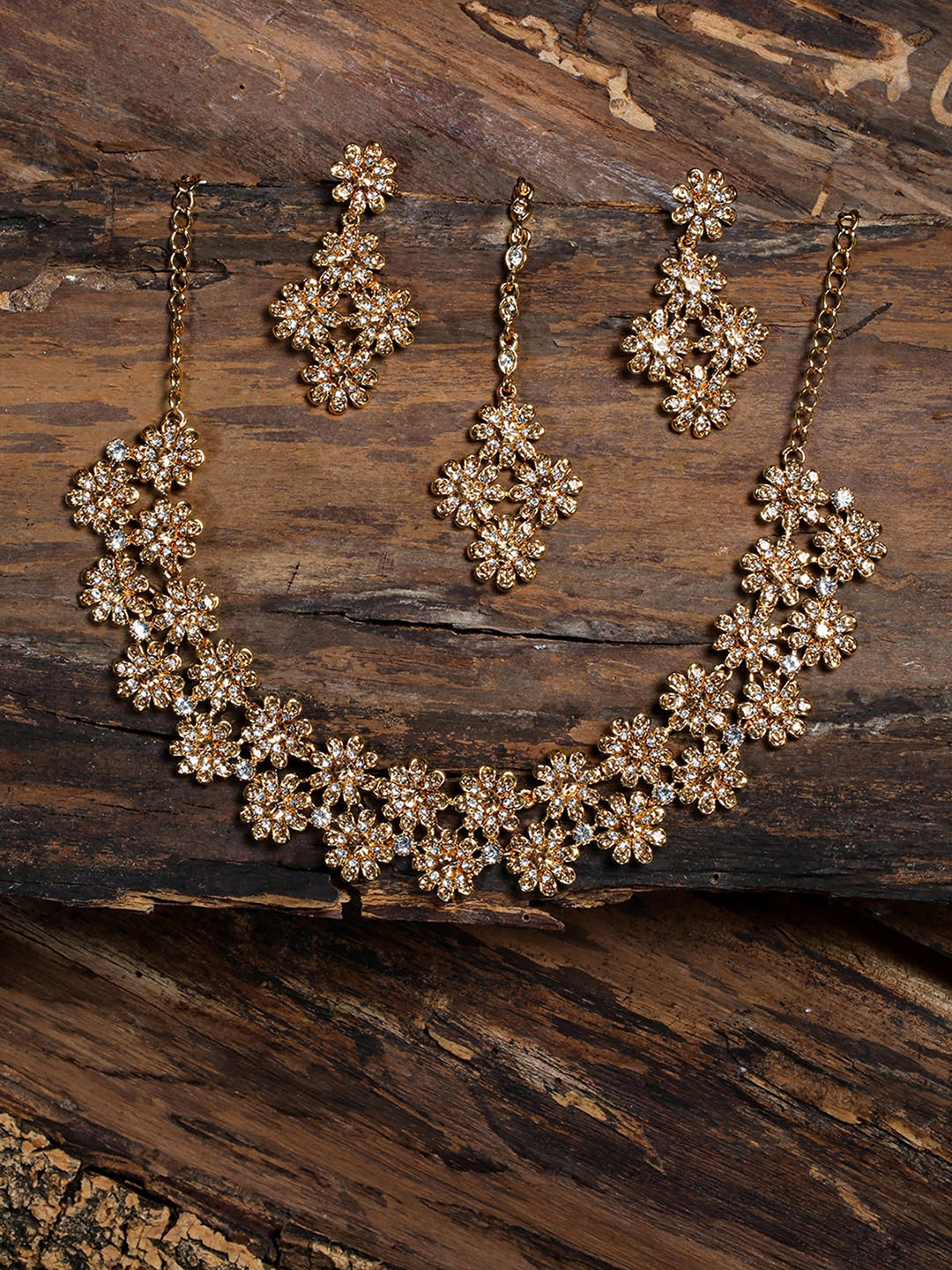 

Zaveri Pearls Gold-Plated & White Stone-Studded Floral-Shaped Antique Jewellery Set