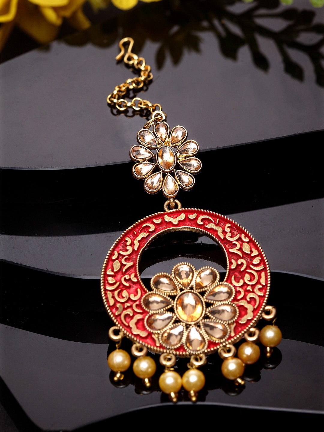 

ANIKAS CREATION Gold-Plated & Red Stone Studded Enameled Hand Painted Traditional Maang Tikka