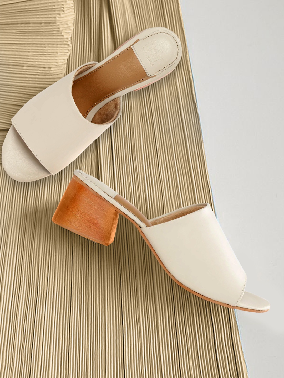 

her by invictus Women Off-White Solid Heeled Mules