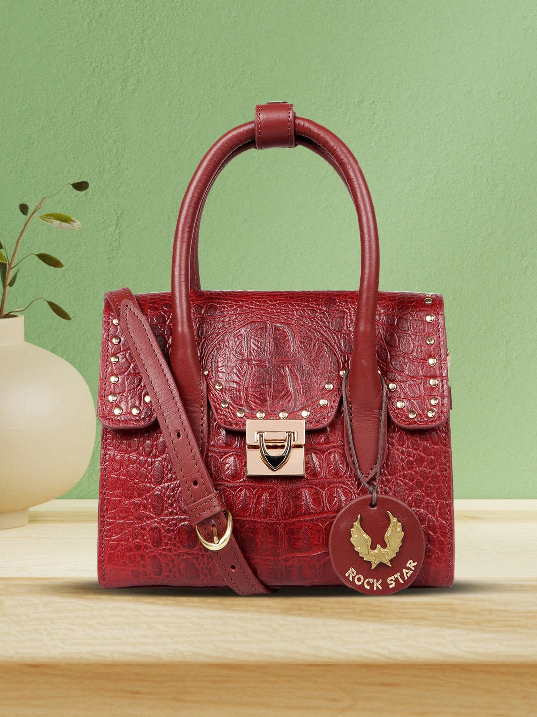 

Hidesign Maroon Textured Leather Handheld Bag