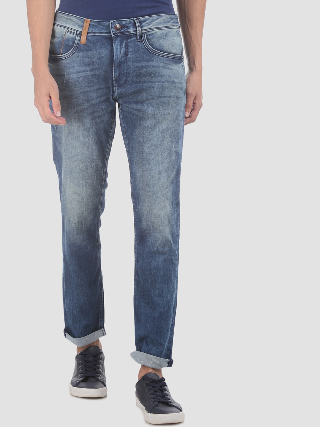 

Ed Hardy Men Blue Tapered Fit Mid-Rise Low Distress Stretchable Jeans