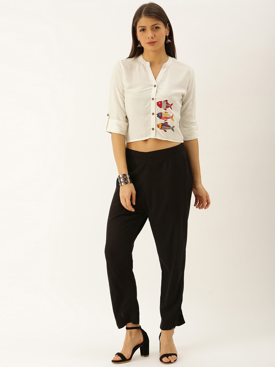 

Varanga Women White Solid Top with Palazzos