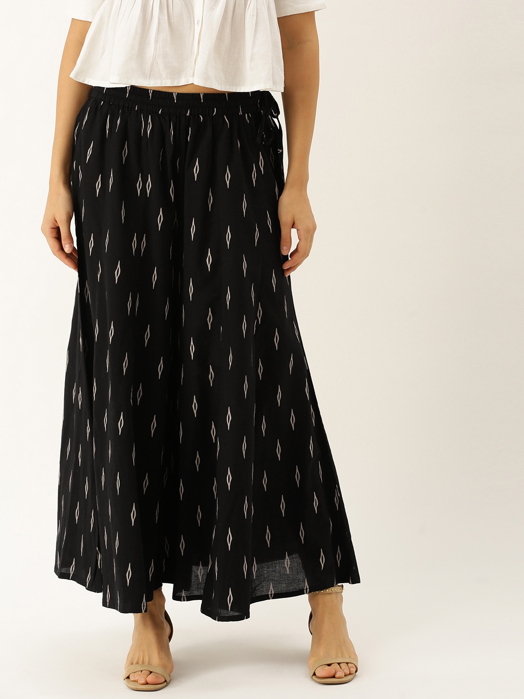 

Varanga Women Black & Beige Printed Flared Palazzos