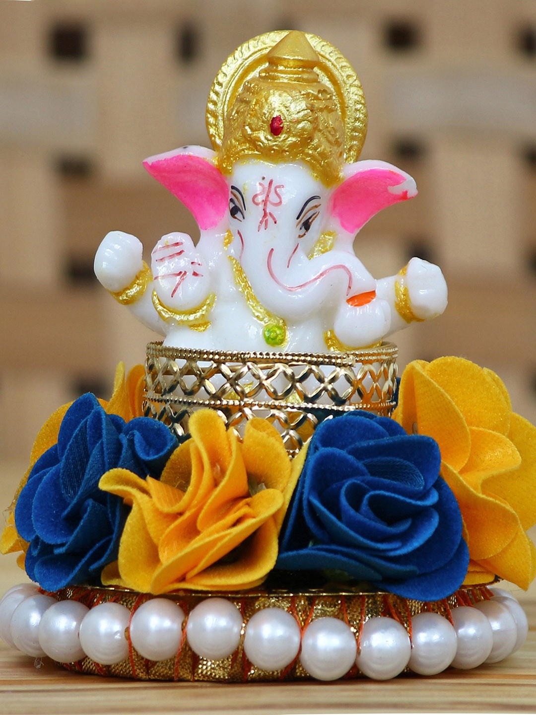 

eCraftIndia White & Yellow Handcrafted Lord Ganesha Idol on Decorated Plate