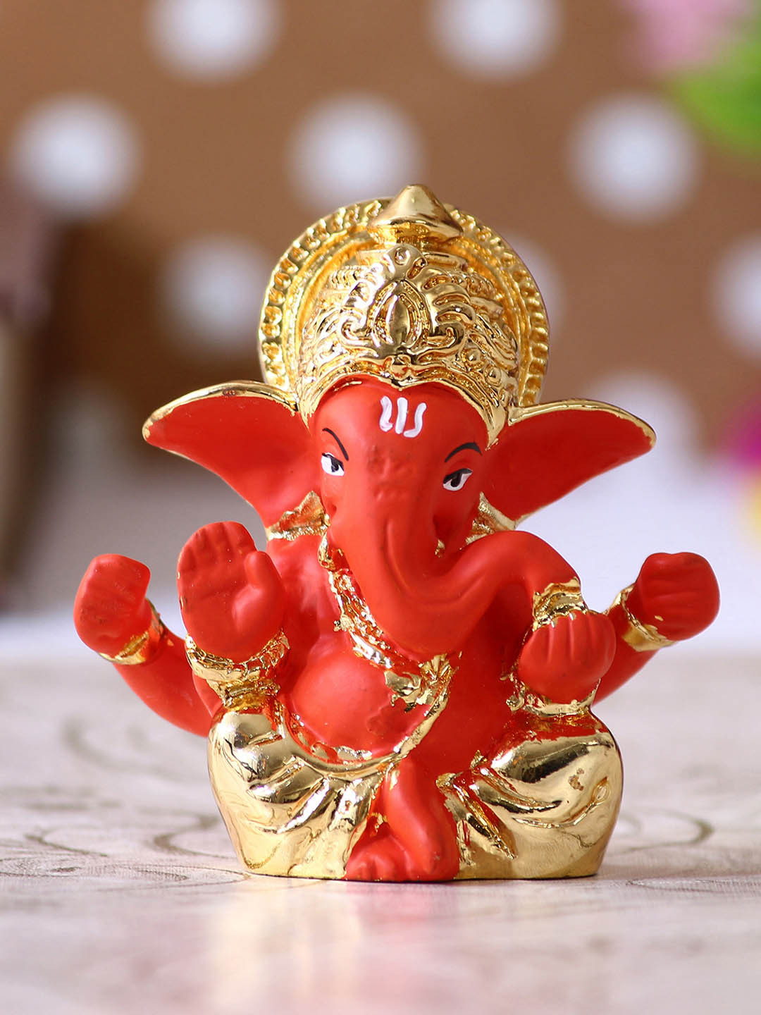 

eCraftIndia Orange & Gold-Toned Handcrafted Lord Ganesha Idol