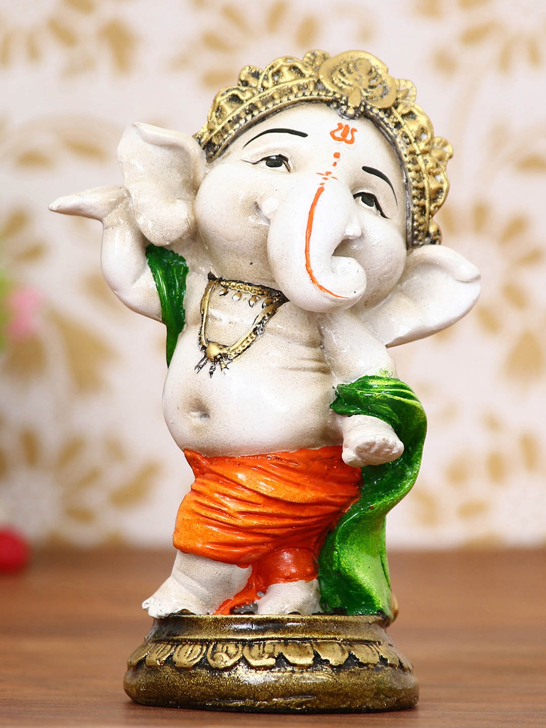

eCraftIndia Off-White & Orange Handcrafted Lord Ganesha Dancing Avatar Idol