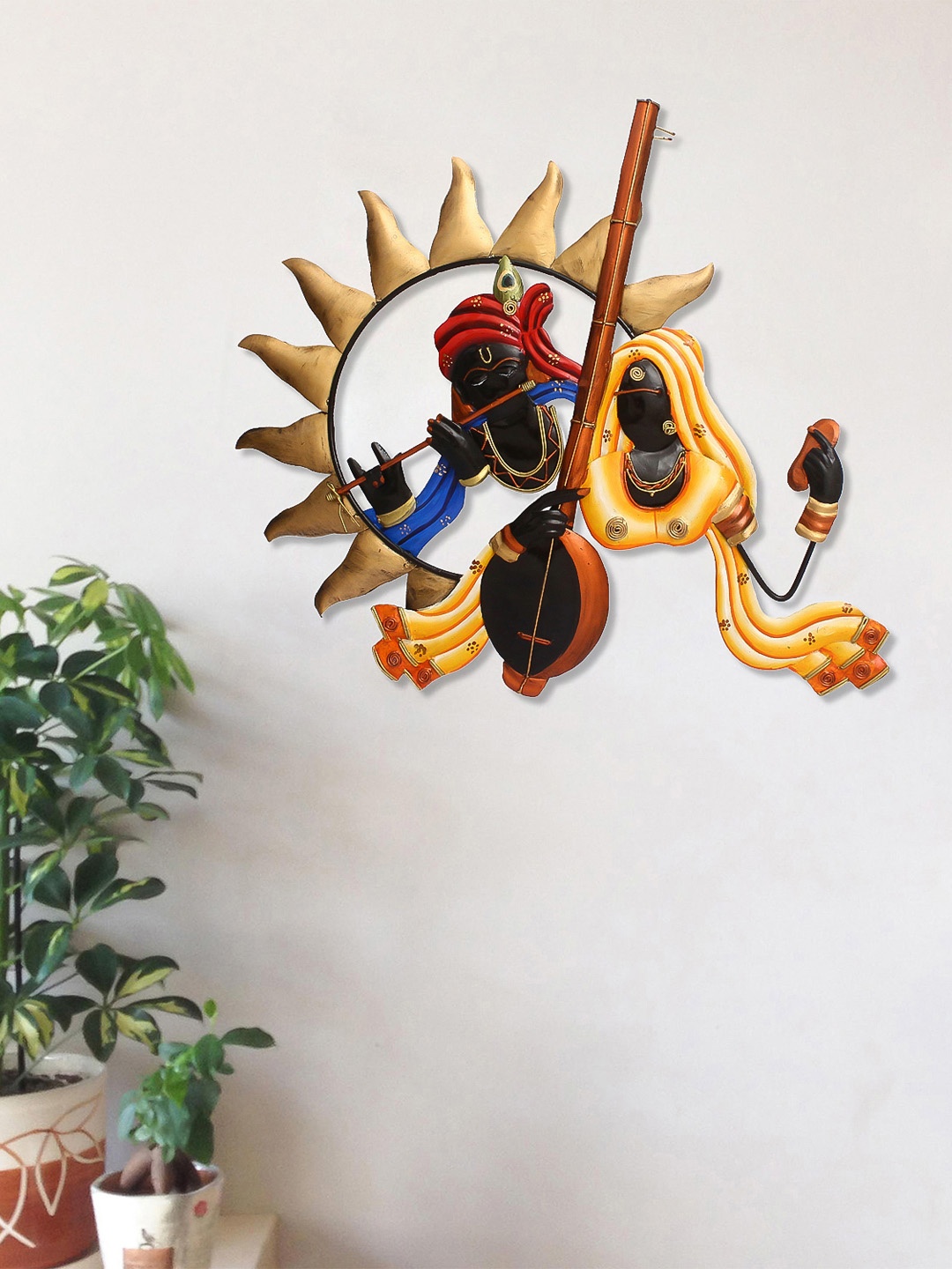 

eCraftIndia Black & Gold-Toned Handcrafted Radha & Krishna Playing Instruments Wall Decor