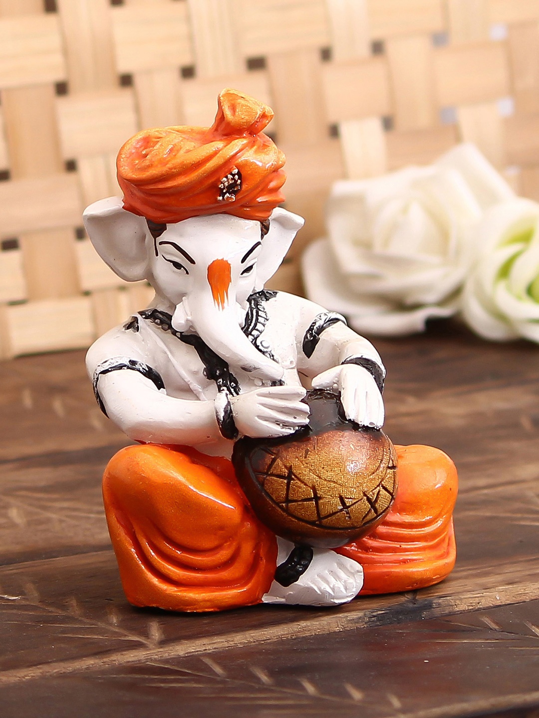 

eCraftIndia Orange & White Lord Ganesha Playing Tabla Decorative Showpiece