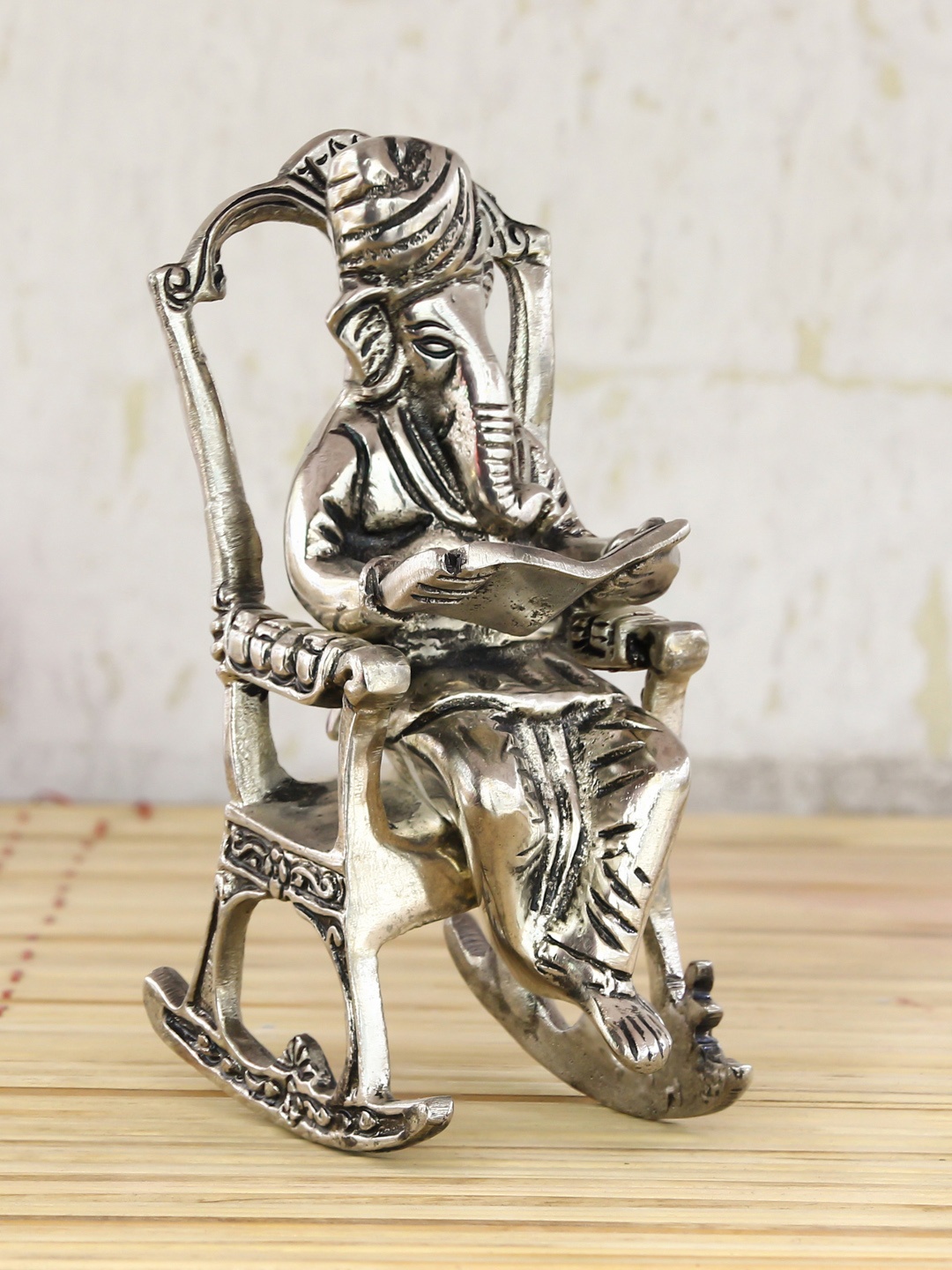 

eCraftIndia Silver-Toned Lord Ganesha On Rocking Chair Antique Showpiece