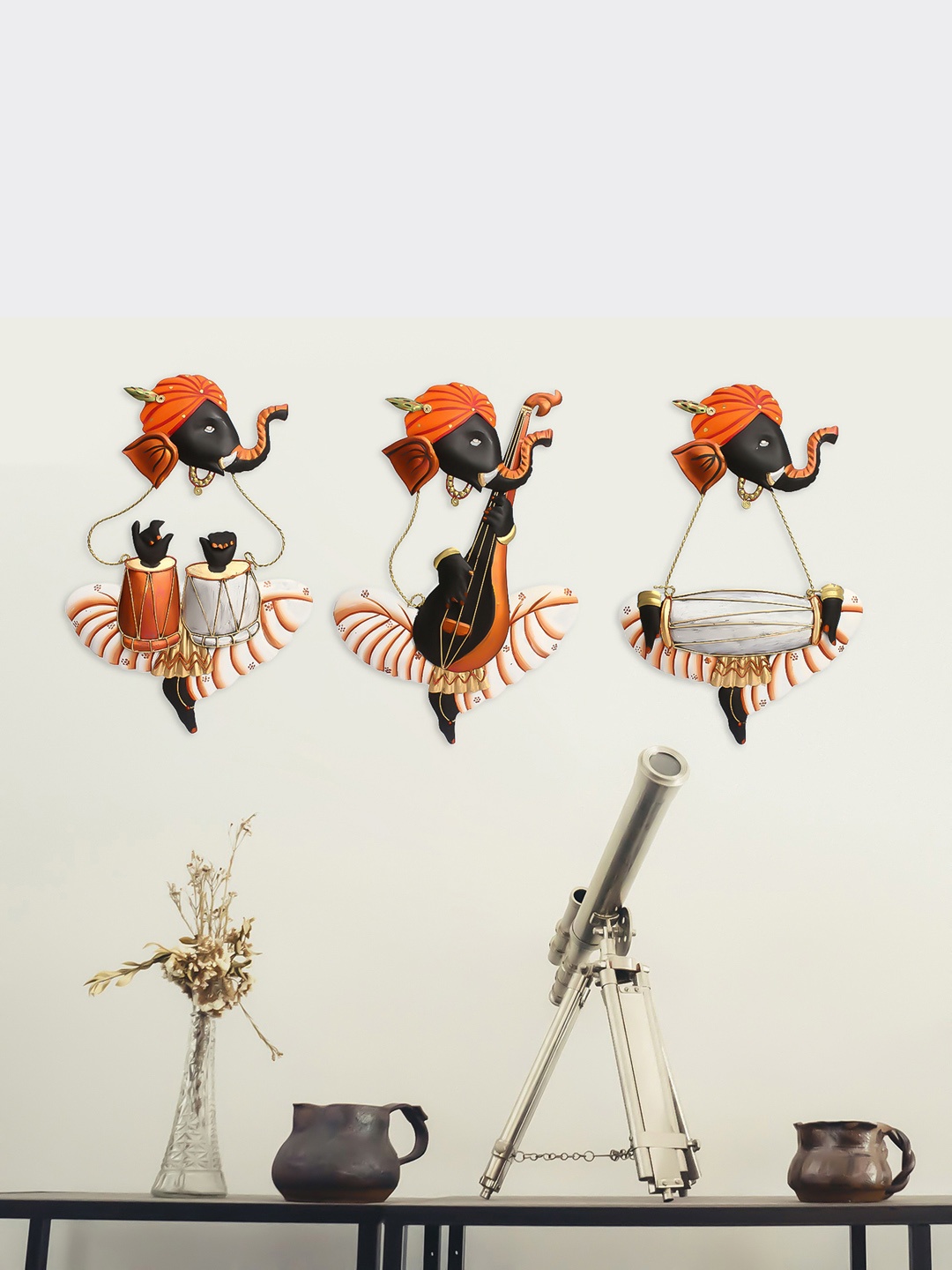 

eCraftIndia Set Of 3 Orange & Black Musician Lord Ganesha Wall Hangings