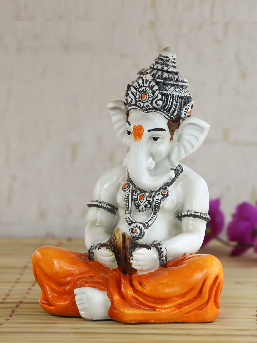 

eCraftIndia Orange & White Handcrafted Lord Ganesha Playing Manjeera Showpiece
