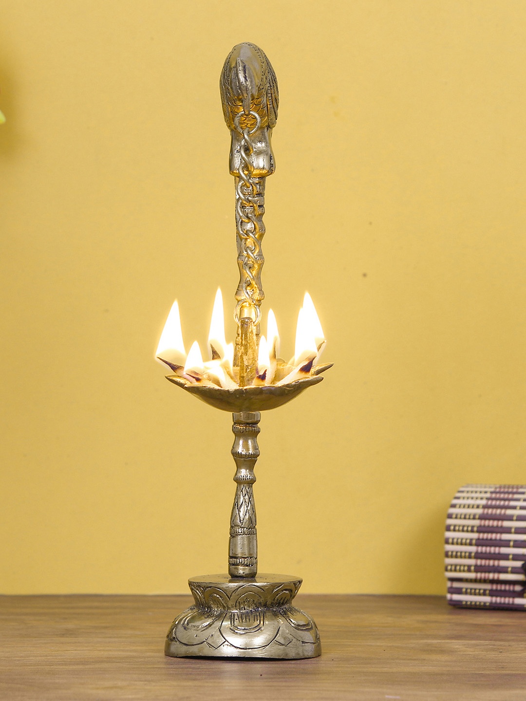 

eCraftIndia Gold-Toned Handcrafted Bird With 7 Wicks Diya Decorative Showpiece