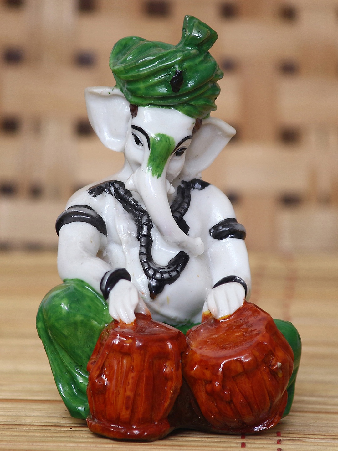 

eCraftIndia Green & White Lord Ganesha Playing Tabla Showpiece