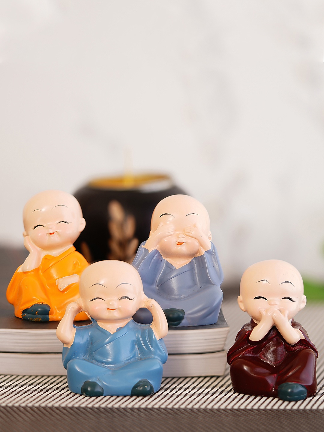 

eCraftIndia Set of 4 Beige & Blue Handcrafted Child Monk Buddha Showpieces