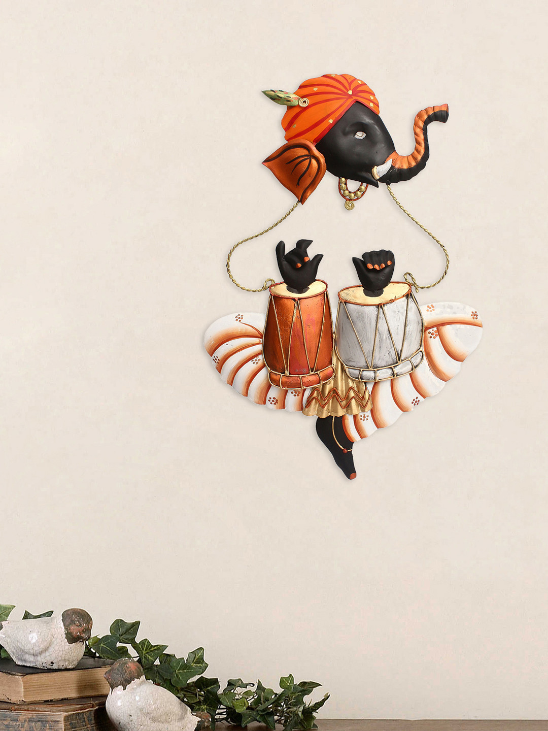 

eCraftIndia Orange & Black Handcrafted Musician Ganesha Playing Tabla Wall Hanging Showpiece
