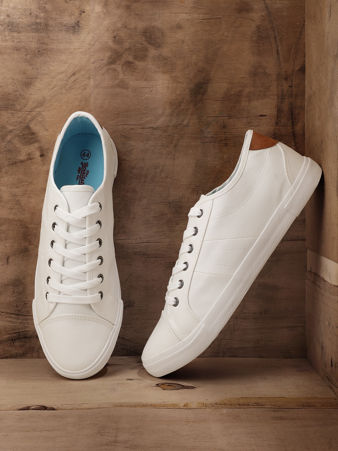 

Roadster Men White Solid Sneakers