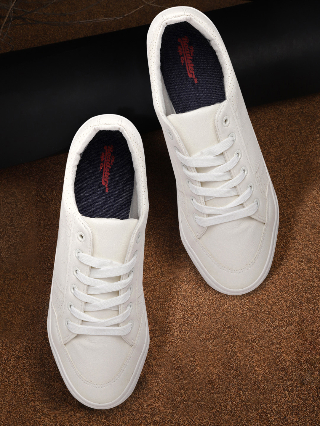 

Roadster Men White Solid Sneakers