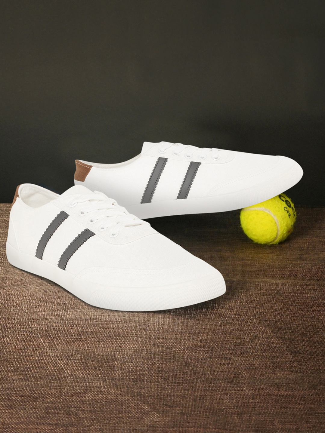 

Roadster Men White Solid Sneakers