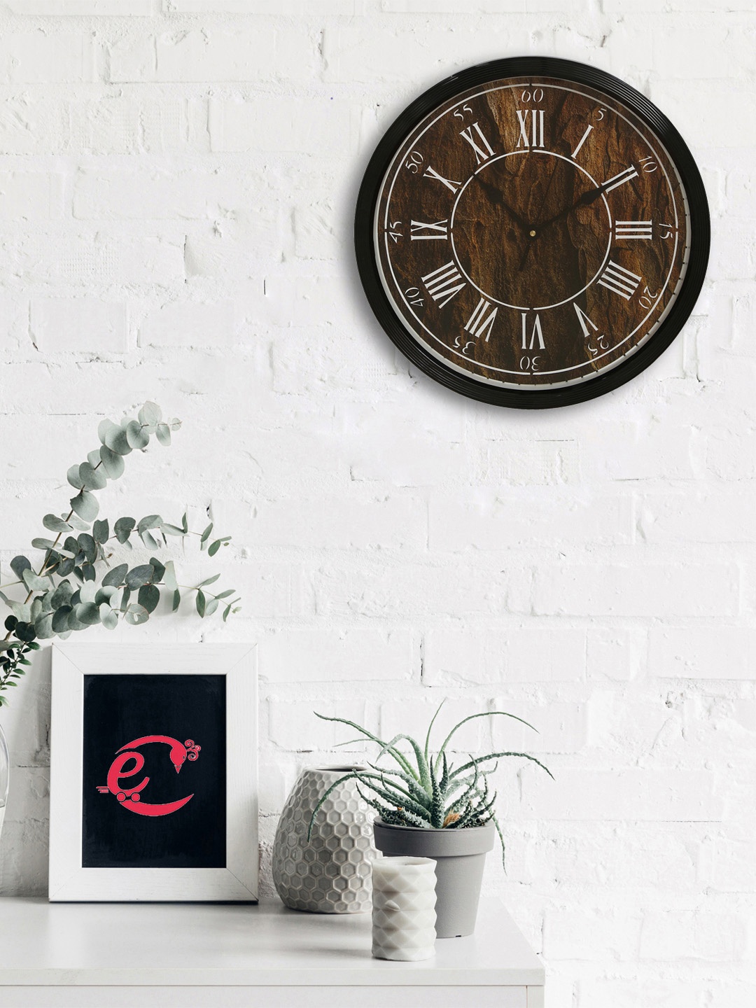 

eCraftIndia Brown Round Solid Analogue Wall Clock