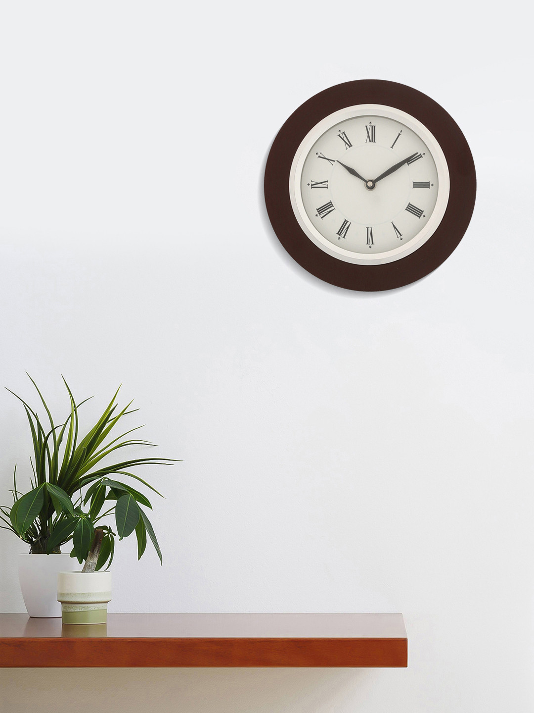 

eCraftIndia Off-White Round Solid Analogue Wall Clock