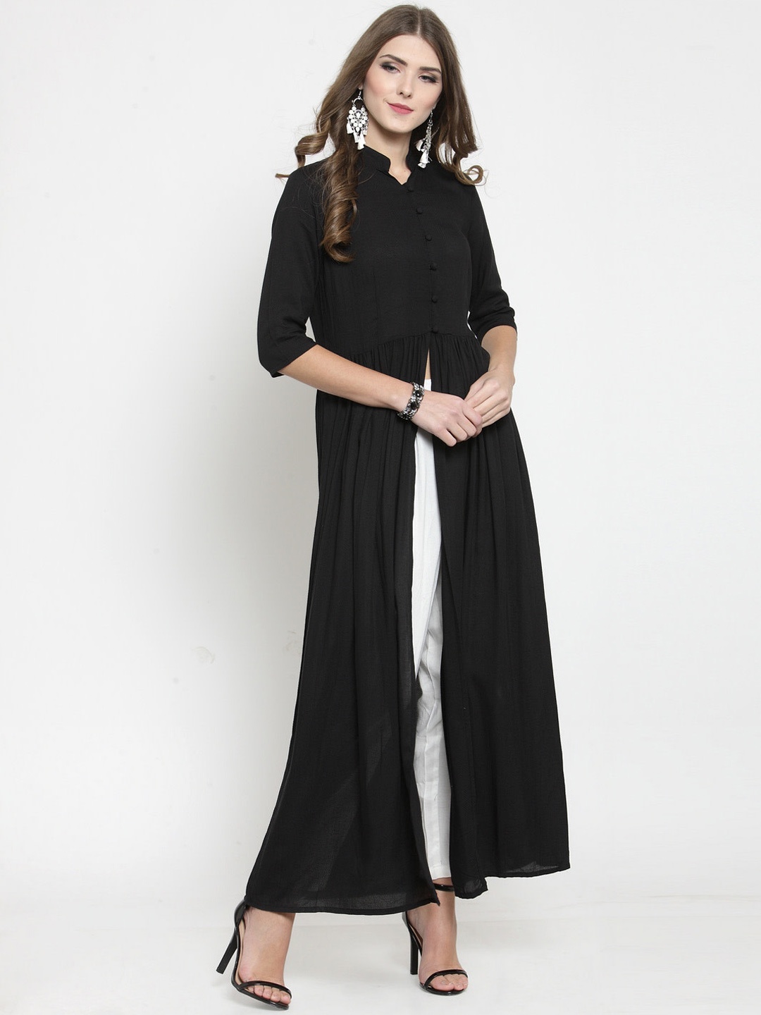 

Sera Women Black & White Solid Kurta with Palazzos