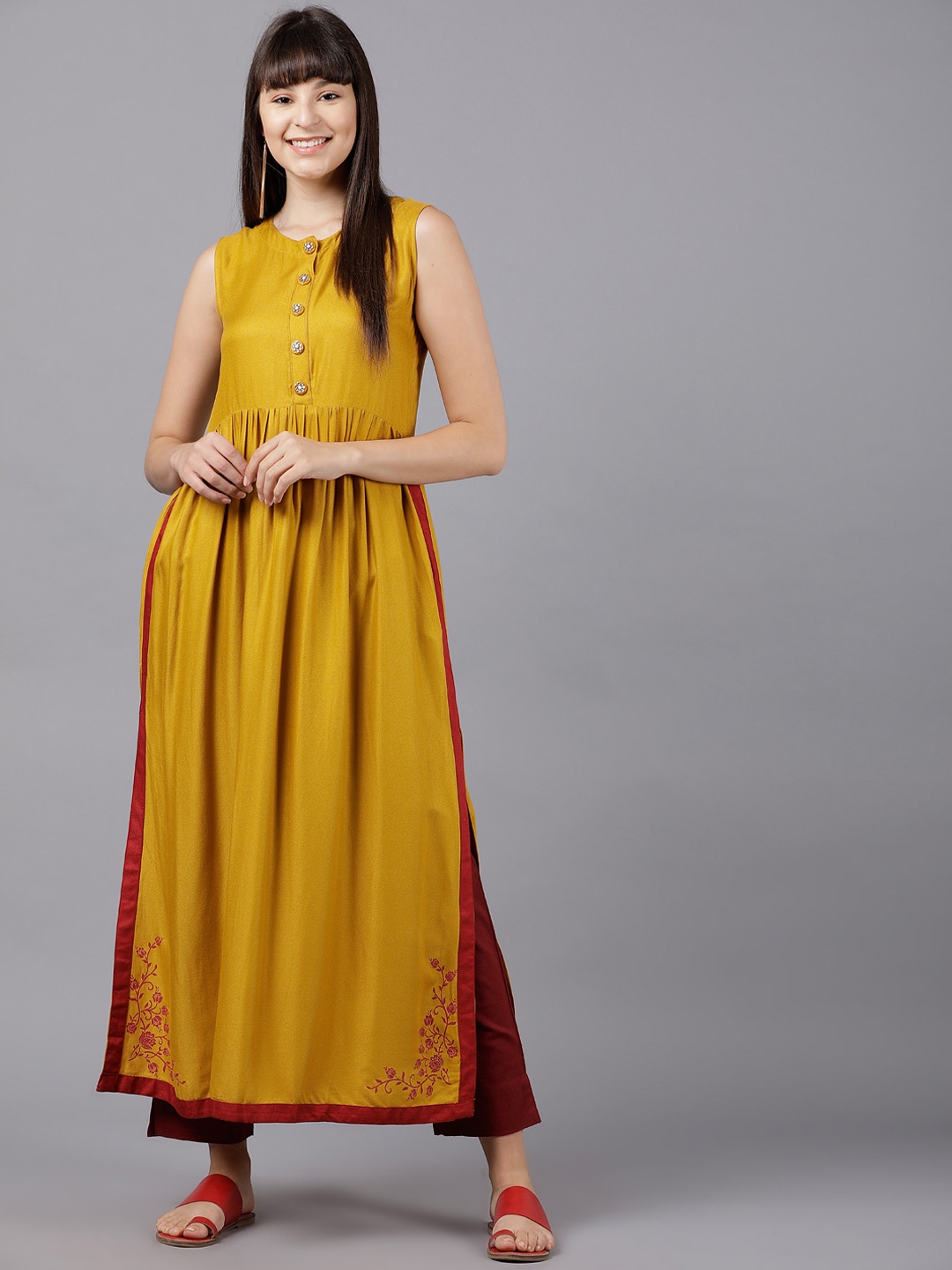 

Vishudh Women Mustard Yellow Solid Straight Kurta with Jacket