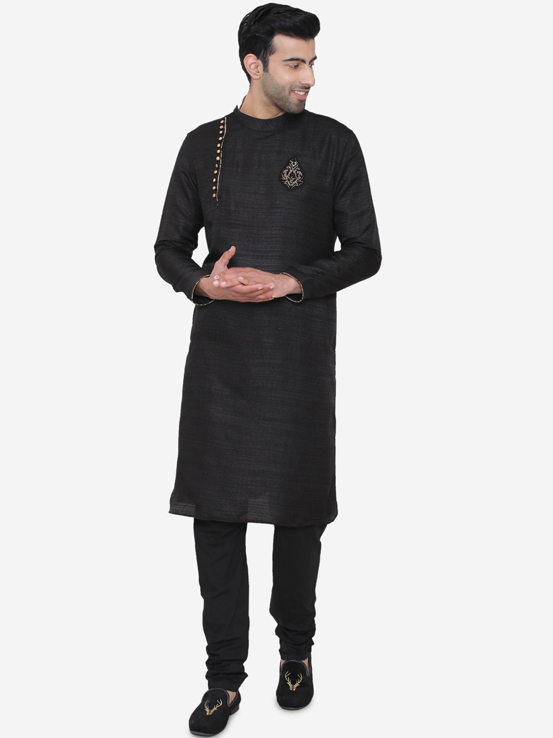

Manyavar Men Black Solid Kurta with Churidar