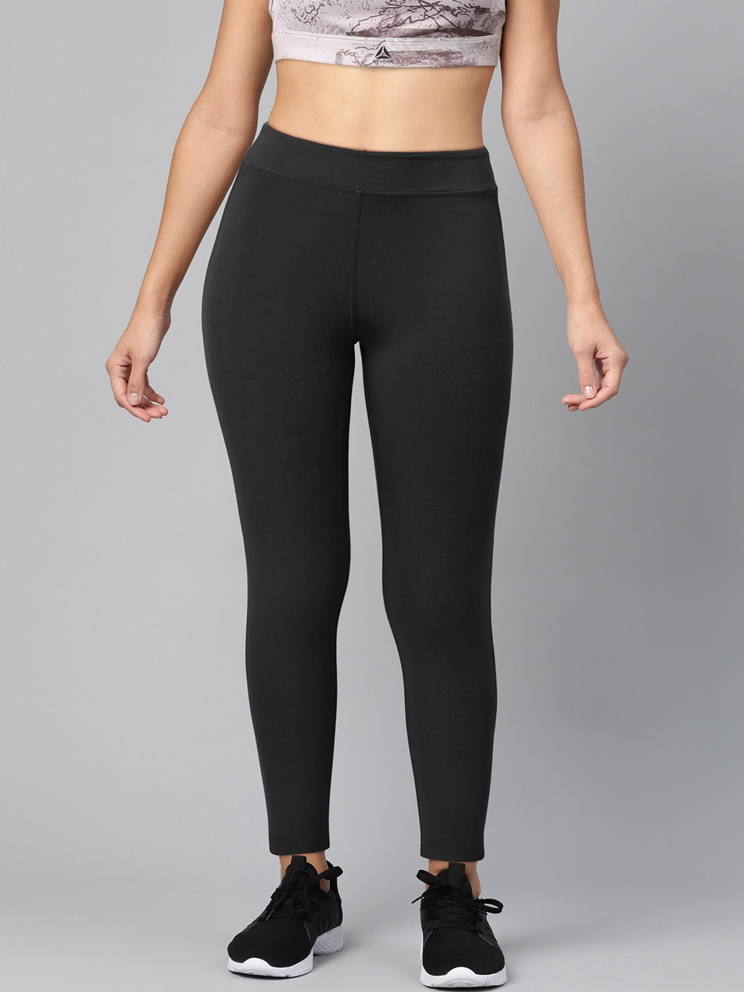 

Reebok Women Black Solid Training Workout Ready PP Tights