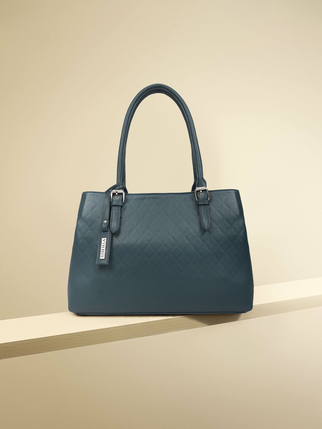 

Toteteca Teal Quilted Shoulder Bag