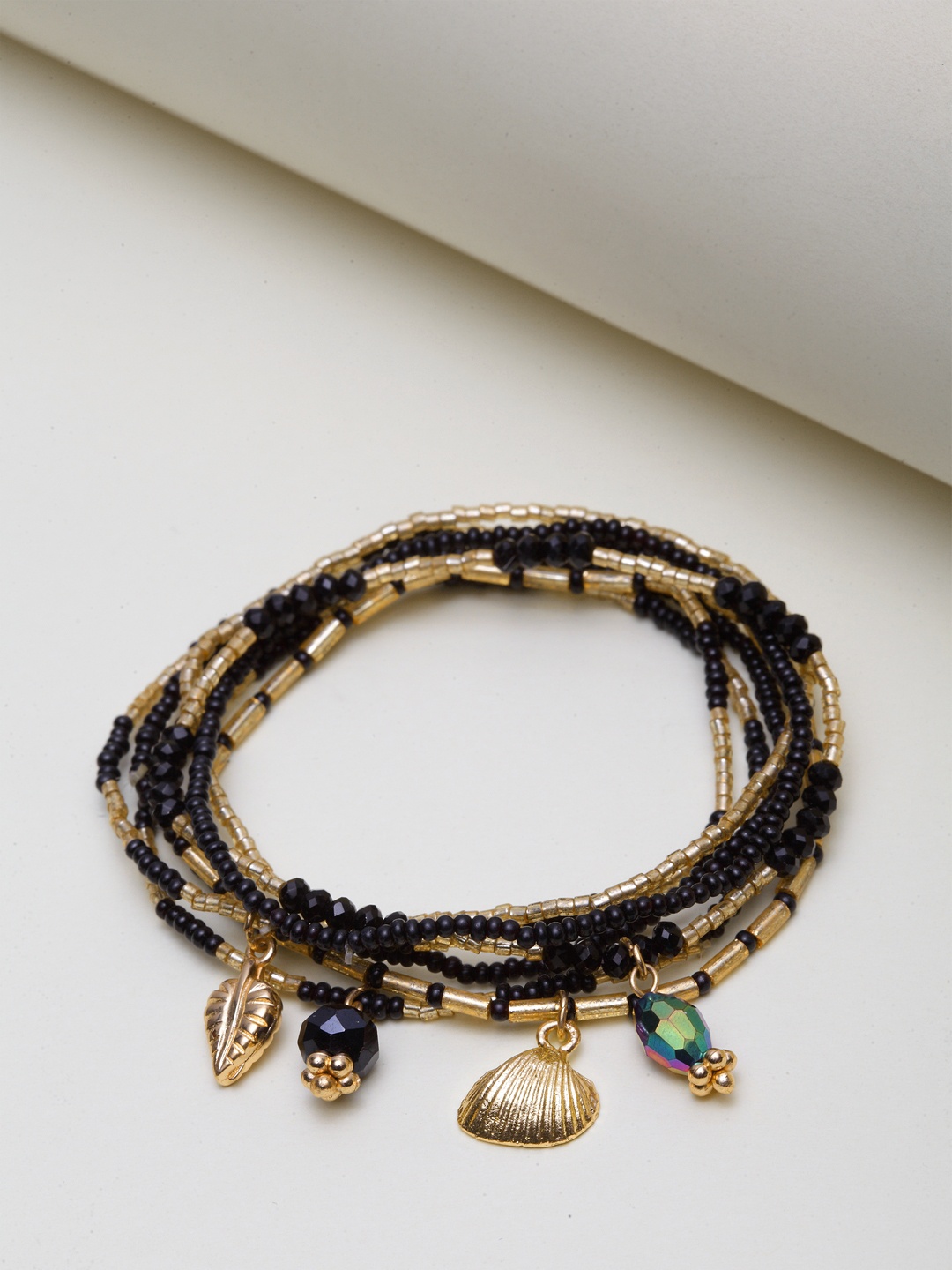 

Madame Set of 7 Black & Rose Gold-Plated Elasticated Charm Bracelets