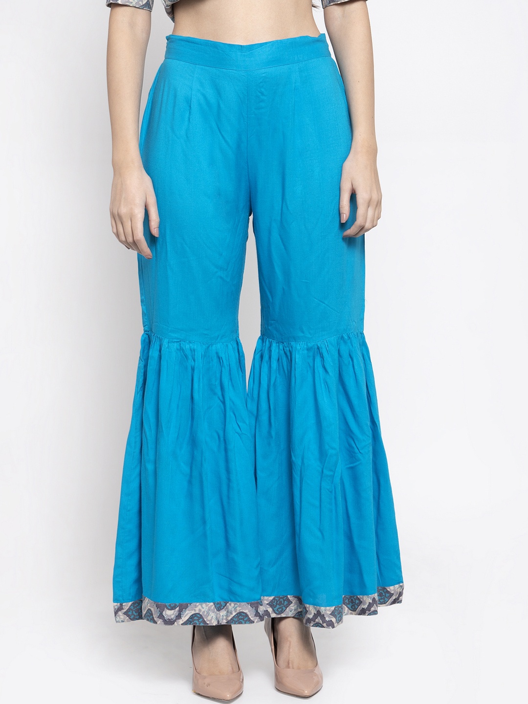 

Indibelle Women Blue Solid Flared Palazzos