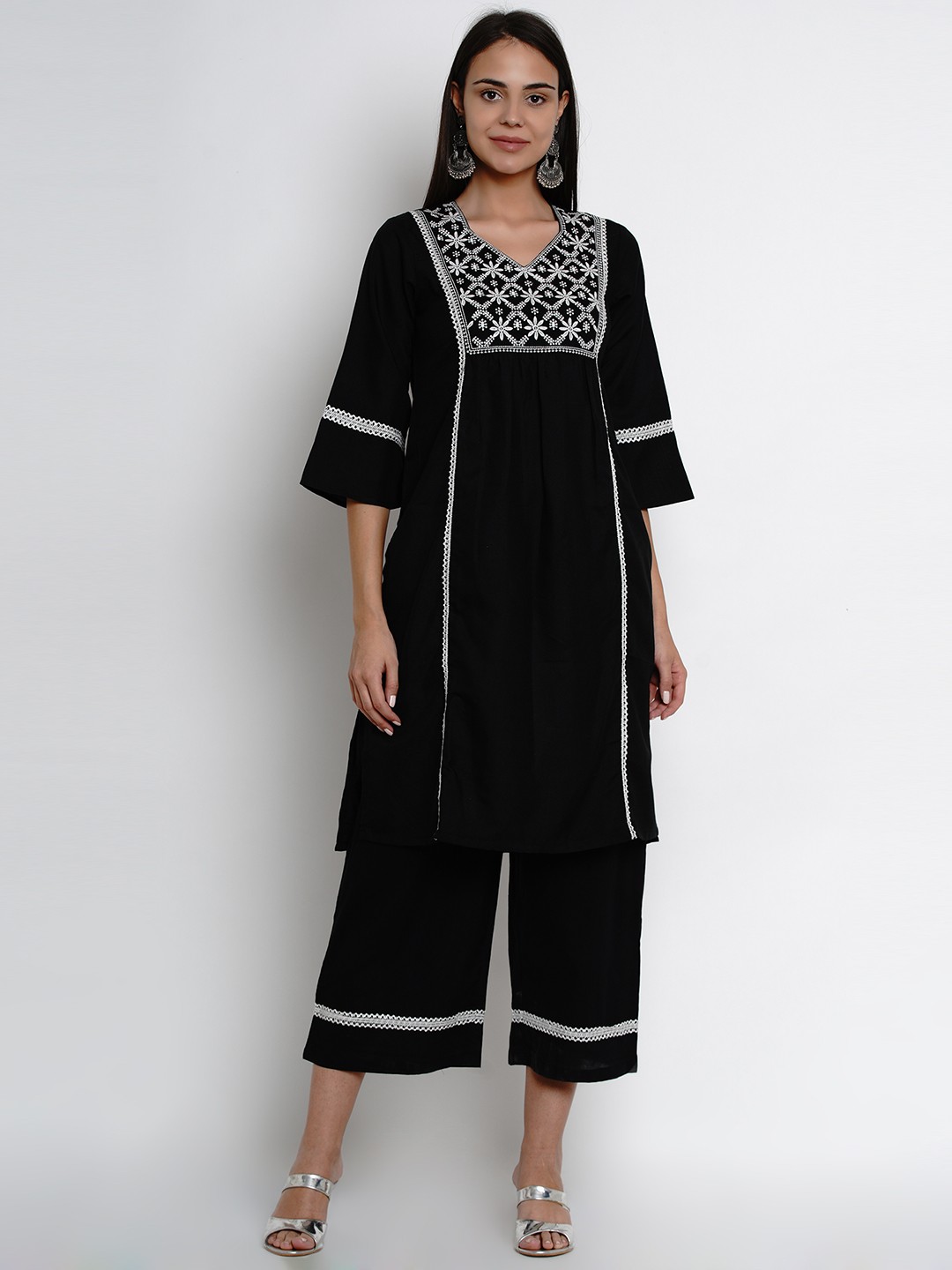 

Bhama Couture Women Black Embroidered Kurta with Palazzos